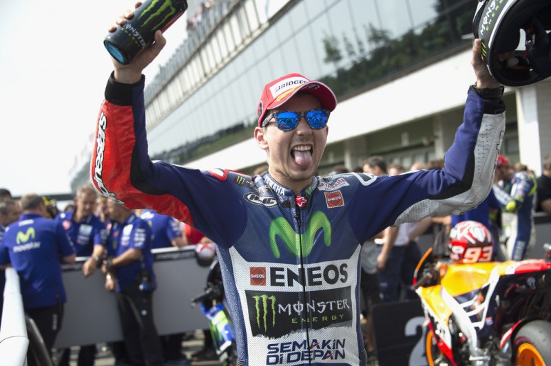 Jorge Lorenzo of Spain and Movistar Yamaha MotoGP celebrates the victory under the podium at the end of the MotoGP race during the MotoGp of Czech Republic - Race at Brno Circuit on August 16, 2015 in Brno, Czech Republic. Jorge Lorenzo of Spain and Movistar Yamaha MotoGP celebrates the victory under the podium at the end of the MotoGP race during the MotoGp of Czech Republic - Race at Brno Circuit on August 16, 2015 in Brno, Czech Republic.