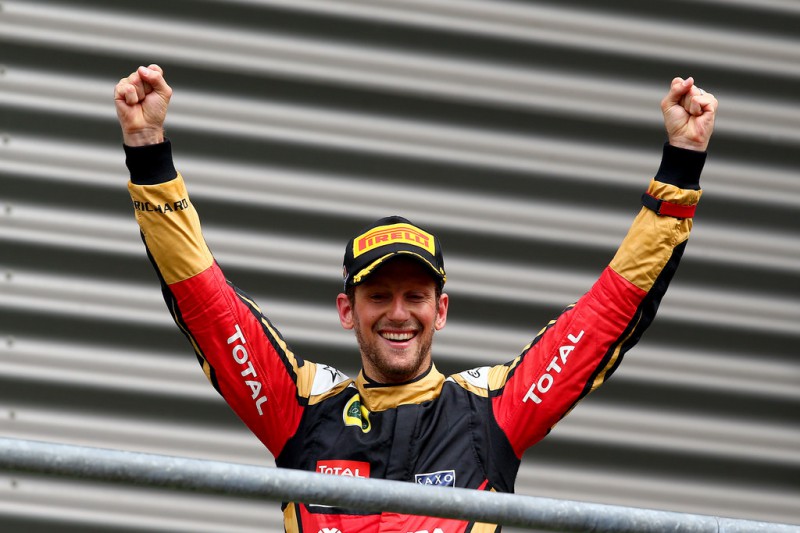 Romain Grosjean of France and Lotus celebrates on the podium after finishing third in the Formula One Grand Prix of Belgium at Circuit de Spa-Francorchamps on August 23, 2015 in Spa, Belgium. Romain Grosjean of France and Lotus celebrates on the podium after finishing third in the Formula One Grand Prix of Belgium at Circuit de Spa-Francorchamps on August 23, 2015 in Spa, Belgium.