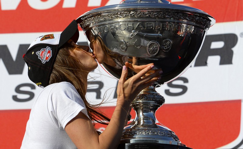 Emma Dixon, wife of Scott Dixon of New Zealand driver of the #9 Target Chip Ganassi Racing Chevrolet Dallara kisses the Championship trophy after Scott won the Verizon IndyCar Series GoPro Grand Prix of Sonoma at Sonoma Raceway on August 30, 2015 in Sonoma, California. Emma Dixon, wife of Scott Dixon of New Zealand driver of the #9 Target Chip Ganassi Racing Chevrolet Dallara kisses the Championship trophy after Scott won the Verizon IndyCar Series GoPro Grand Prix of Sonoma at Sonoma Raceway on August 30, 2015 in Sonoma, California.
