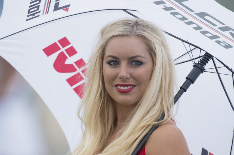 The grid girl poses on the grid of the MotoGP race during the MotoGp Of Great Britain - Race at Silverstone Circuit on August 30, 2015 in Northampton, United Kingdom. 