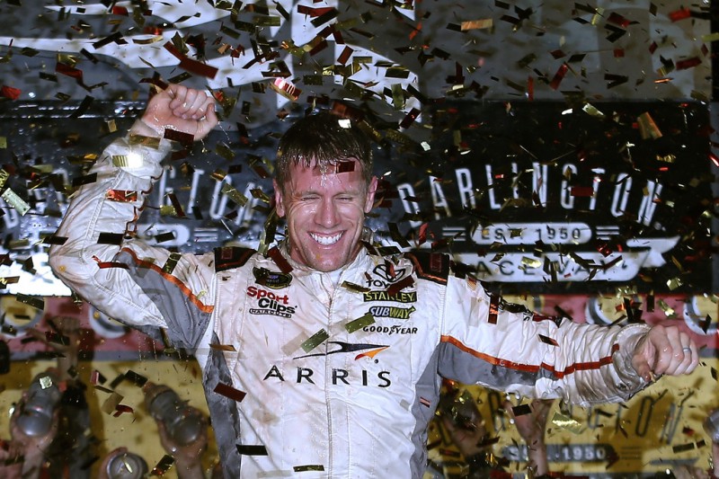 Carl Edwards, driver of the #19 ARRIS Toyota, celebrates in Victory Lane after winning the NASCAR Sprint Cup Series Bojangles' Southern 500 at Darlington Raceway on September 6, 2015 in Darlington, South Carolina. Carl Edwards, driver of the #19 ARRIS Toyota, celebrates in Victory Lane after winning the NASCAR Sprint Cup Series Bojangles' Southern 500 at Darlington Raceway on September 6, 2015 in Darlington, South Carolina.