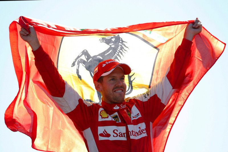 Sebastian Vettel of Germany and Ferrari celebrates on the podium after finishing second in the Formula One Grand Prix of Italy at Autodromo di Monza on September 6, 2015 in Monza, Italy. Sebastian Vettel of Germany and Ferrari celebrates on the podium after finishing second in the Formula One Grand Prix of Italy at Autodromo di Monza on September 6, 2015 in Monza, Italy.