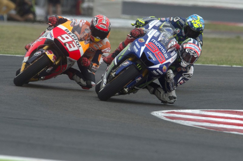Jorge Lorenzo of Spain and Movistar Yamaha MotoGP leads Marc Marquez of Spain and Repsol Honda Team in the MotoGP World Championship race during the San Marino GP at Misano World Circuit on September 13, 2015 in Misano Adriatico, Italy. Jorge Lorenzo of Spain and Movistar Yamaha MotoGP leads Marc Marquez of Spain and Repsol Honda Team in the MotoGP World Championship race during the San Marino GP at Misano World Circuit on September 13, 2015 in Misano Adriatico, Italy.