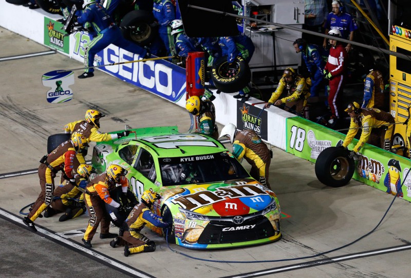 Kyle Busch, driver of the #18 M&M's Crispy/American Heritage Chocolate Toyota, pits during the NASCAR Sprint Cup Series Federated Auto Parts 400 at Richmond International Raceway on September 12, 2015 in Richmond, Virginia. Kyle Busch, driver of the #18 M&M's Crispy/American Heritage Chocolate Toyota, pits during the NASCAR Sprint Cup Series Federated Auto Parts 400 at Richmond International Raceway on September 12, 2015 in Richmond, Virginia.