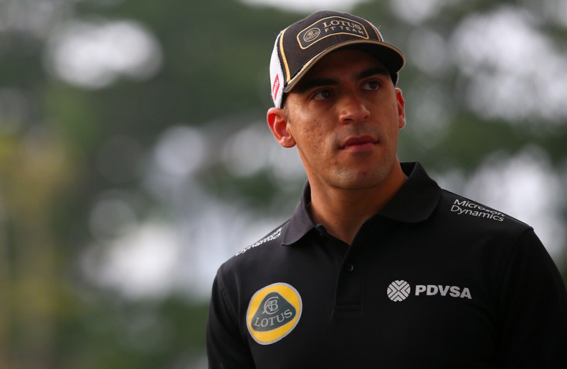 Pastor Maldonado of Venezuela and Lotus walks in the paddock before the Formula One Grand Prix of Singapore at Marina Bay Street Circuit on September 20, 2015 in Singapore. Pastor Maldonado of Venezuela and Lotus walks in the paddock before the Formula One Grand Prix of Singapore at Marina Bay Street Circuit on September 20, 2015 in Singapore.