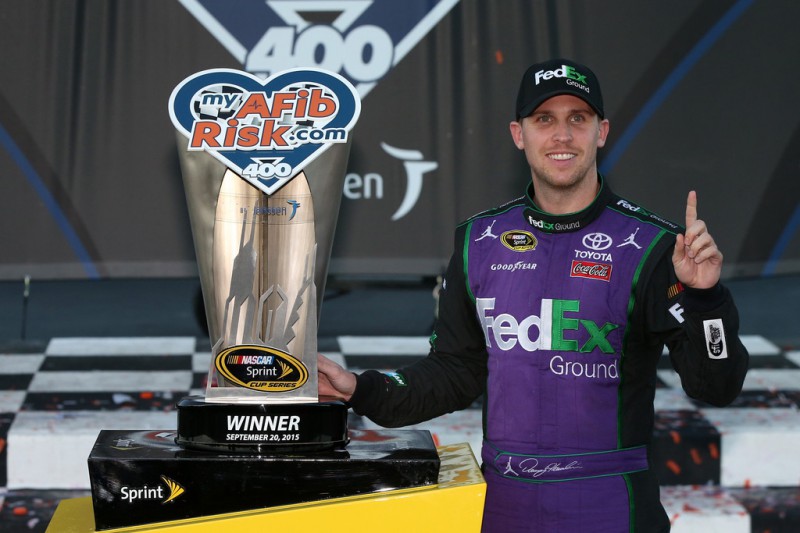 Denny Hamlin, driver of the #11 FedEx Ground Toyota, celebrates in Victory Lane after winning the NASCAR Sprint Cup Series myAFibRisk.com 400 at Chicagoland Speedway on September 20, 2015 in Joliet, Illinois. Denny Hamlin, driver of the #11 FedEx Ground Toyota, celebrates in Victory Lane after winning the NASCAR Sprint Cup Series myAFibRisk.com 400 at Chicagoland Speedway on September 20, 2015 in Joliet, Illinois.