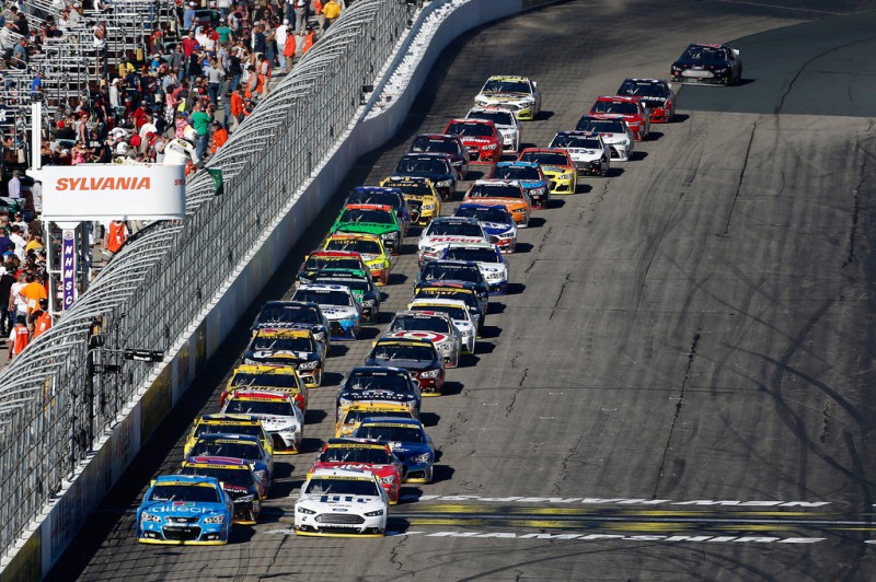 Kevin Harvick, driver of the #4 Ditech Chevrolet, and Brad Keselowski, driver of the #2 Miller Lite Ford, lead the field to a restart during the NASCAR Sprint Cup Series SYLVANIA 300 at New Hampshire Motor Speedway on September 27, 2015 in Loudon, New Hampshire. Kevin Harvick, driver of the #4 Ditech Chevrolet, and Brad Keselowski, driver of the #2 Miller Lite Ford, lead the field to a restart during the NASCAR Sprint Cup Series SYLVANIA 300 at New Hampshire Motor Speedway on September 27, 2015 in Loudon, New Hampshire.