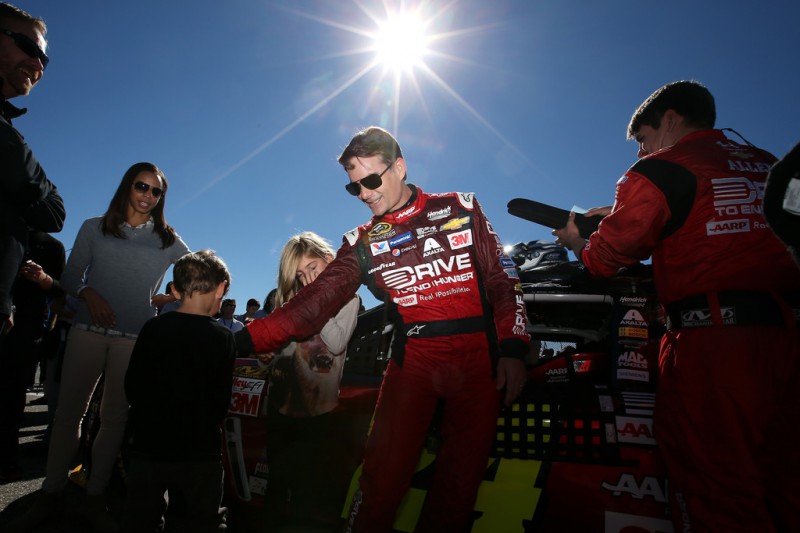 Jeff Gordon, driver of the #24 Drive To End Hunger Chevrolet, stands on the grid prior to the NASCAR Sprint Cup Series SYLVANIA 300 at New Hampshire Motor Speedway on September 27, 2015 in Loudon, New Hampshire. Jeff Gordon, driver of the #24 Drive To End Hunger Chevrolet, stands on the grid prior to the NASCAR Sprint Cup Series SYLVANIA 300 at New Hampshire Motor Speedway on September 27, 2015 in Loudon, New Hampshire.