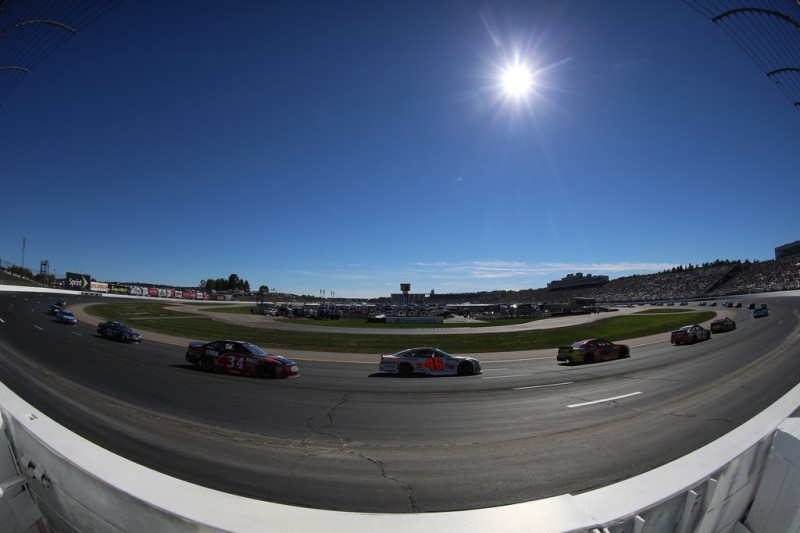 A view of cars racing during the NASCAR Sprint Cup Series SYLVANIA 300 at New Hampshire Motor Speedway on September 27, 2015 in Loudon, New Hampshire. A view of cars racing during the NASCAR Sprint Cup Series SYLVANIA 300 at New Hampshire Motor Speedway on September 27, 2015 in Loudon, New Hampshire.