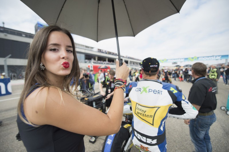 A grid girl poses on the grid during the Moto2 race during the MotoGP of Spain - Race at Motorland Aragon Circuit on September 27, 2015 in Alcaniz, Spain. A grid girl poses on the grid during the Moto2 race during the MotoGP of Spain - Race at Motorland Aragon Circuit on September 27, 2015 in Alcaniz, Spain.