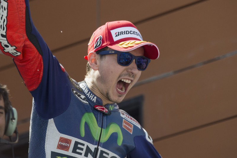 Jorge Lorenzo of Spain and Movistar Yamaha MotoGP celebrates the victory on the podium at the end of the MotoGP race during the MotoGP of Spain - Race at Motorland Aragon Circuit on September 27, 2015 in Alcaniz, Spain. Jorge Lorenzo of Spain and Movistar Yamaha MotoGP celebrates the victory on the podium at the end of the MotoGP race during the MotoGP of Spain - Race at Motorland Aragon Circuit on September 27, 2015 in Alcaniz, Spain.