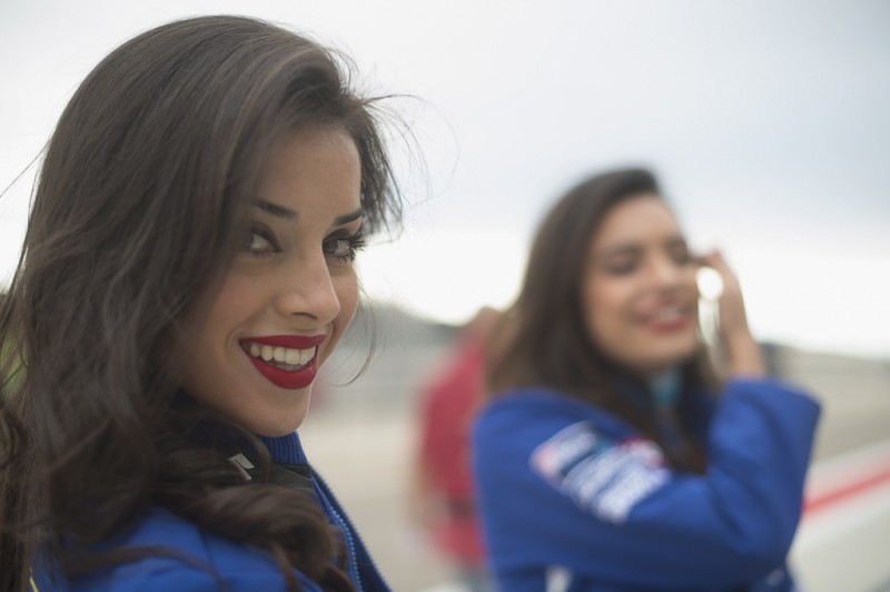 A grid girl poses on the grid during the MotoGP race during the MotoGP of Spain - Race at Motorland Aragon Circuit on September 27, 2015 in Alcaniz, Spain. A grid girl poses on the grid during the MotoGP race during the MotoGP of Spain - Race at Motorland Aragon Circuit on September 27, 2015 in Alcaniz, Spain.