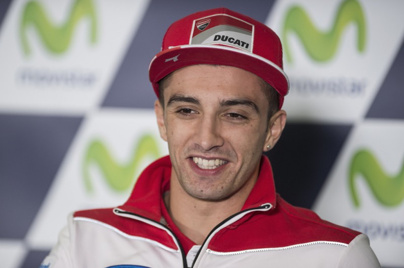 Andrea Iannone of Italy and Ducati Team smiles during the press conference at the end of the qualifying practice during the MotoGP of Spain - Qualifying at Motorland Aragon Circuit on September 26, 2015 in Alcaniz, Spain. Andrea Iannone of Italy and Ducati Team smiles during the press conference at the end of the qualifying practice during the MotoGP of Spain - Qualifying at Motorland Aragon Circuit on September 26, 2015 in Alcaniz, Spain.