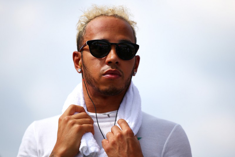 Lewis Hamilton of Great Britain and Mercedes GP prepares on the grid before the Formula One Grand Prix of Japan at Suzuka Circuit on September 27, 2015 in Suzuka, Japan. Lewis Hamilton of Great Britain and Mercedes GP prepares on the grid before the Formula One Grand Prix of Japan at Suzuka Circuit on September 27, 2015 in Suzuka, Japan.
