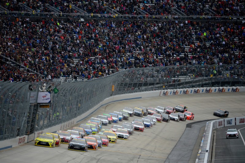 Matt Kenseth, driver of the #20 Dollar General Toyota, and Denny Hamlin, driver of the #11 FedEx Office Toyota, lead the field to the green flag to start the NASCAR Sprint Cup Series AAA 400 at Dover International Speedway on October 4, 2015 in Dover, Delaware. Matt Kenseth, driver of the #20 Dollar General Toyota, and Denny Hamlin, driver of the #11 FedEx Office Toyota, lead the field to the green flag to start the NASCAR Sprint Cup Series AAA 400 at Dover International Speedway on October 4, 2015 in Dover, Delaware.