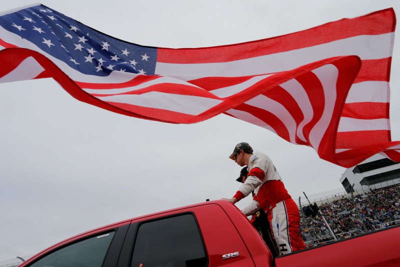 Brad Keselowski, driver of the #2 Wurth Ford, and Martin Truex Jr., driver of the #78 Furniture Row/Visser Precision Chevrolet, take part in pre-race ceremonies for the NASCAR Sprint Cup Series AAA 400 at Dover International Speedway on October 4, 2015 in Dover, Delaware. Brad Keselowski, driver of the #2 Wurth Ford, and Martin Truex Jr., driver of the #78 Furniture Row/Visser Precision Chevrolet, take part in pre-race ceremonies for the NASCAR Sprint Cup Series AAA 400 at Dover International Speedway on October 4, 2015 in Dover, Delaware.