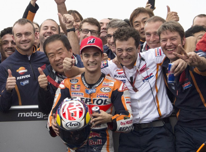 Dani Pedrosa of Spain and Repsol Honda Team celebrates the victory with team under the podium at the end of the MotoGP race during the MotoGP Of Japan - Race at Twin Ring Motegi on October 11, 2015 in Motegi, Japan. Dani Pedrosa of Spain and Repsol Honda Team celebrates the victory with team under the podium at the end of the MotoGP race during the MotoGP Of Japan - Race at Twin Ring Motegi on October 11, 2015 in Motegi, Japan.