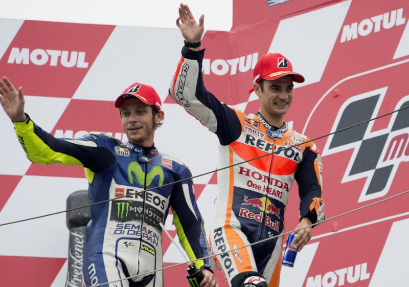 Dani Pedrosa of Spain and Repsol Honda Team celebrates with Valentino Rossi of Italy and Movistar Yamaha MotoGP (L) on the podium at the end of the MotoGP race during the MotoGP Of Japan - Race at Twin Ring Motegi on October 11, 2015 in Motegi, Japan. Dani Pedrosa of Spain and Repsol Honda Team celebrates with Valentino Rossi of Italy and Movistar Yamaha MotoGP (L) on the podium at the end of the MotoGP race during the MotoGP Of Japan - Race at Twin Ring Motegi on October 11, 2015 in Motegi, Japan.