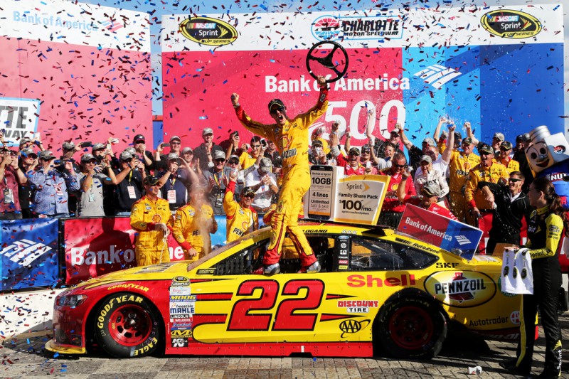 Joey Logano, driver of the #22 Shell Pennzoil Ford, celebrates in Victory Lane after winning the NASCAR Sprint Cup Series Bank of America 500 at Charlotte Motor Speedway on October 11, 2015 in Charlotte, North Carolina. Joey Logano, driver of the #22 Shell Pennzoil Ford, celebrates in Victory Lane after winning the NASCAR Sprint Cup Series Bank of America 500 at Charlotte Motor Speedway on October 11, 2015 in Charlotte, North Carolina.