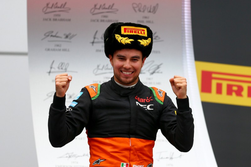 Sergio Perez of Mexico and Force India celebrates on the podium after finishing third in the Formula One Grand Prix of Russia at Sochi Autodrom on October 11, 2015 in Sochi, Russia. Sergio Perez of Mexico and Force India celebrates on the podium after finishing third in the Formula One Grand Prix of Russia at Sochi Autodrom on October 11, 2015 in Sochi, Russia.