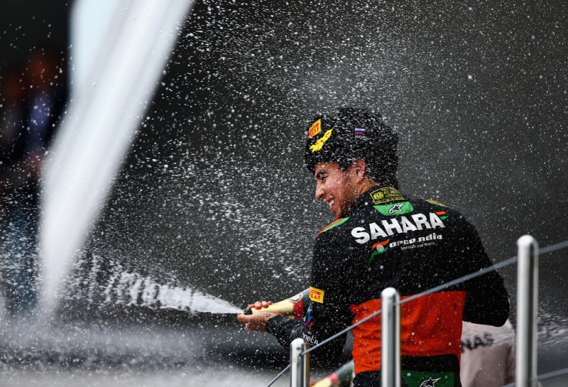 Sergio Perez of Mexico and Force India celebrates on the podium after finishing third in the Formula One Grand Prix of Russia at Sochi Autodrom on October 11, 2015 in Sochi, Russia. Sergio Perez of Mexico and Force India celebrates on the podium after finishing third in the Formula One Grand Prix of Russia at Sochi Autodrom on October 11, 2015 in Sochi, Russia.