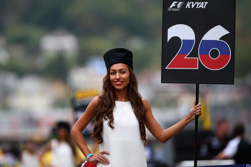 A grid girl poses next to Daniil Kvyat of Russia and Infiniti Red Bull Racing's position on the grid before the Formula One Grand Prix of Russia at Sochi Autodrom on October 11, 2015 in Sochi, Russia. A grid girl poses next to Daniil Kvyat of Russia and Infiniti Red Bull Racing's position on the grid before the Formula One Grand Prix of Russia at Sochi Autodrom on October 11, 2015 in Sochi, Russia.