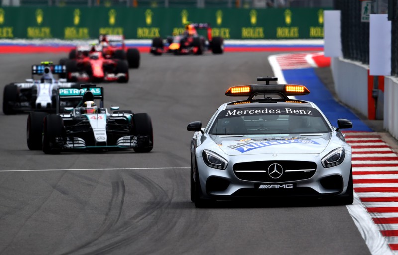 The safety car drives ahead of Lewis Hamilton of Great Britain and Mercedes GP and the rest of the field during the Formula One Grand Prix of Russia at Sochi Autodrom on October 11, 2015 in Sochi, Russia. The safety car drives ahead of Lewis Hamilton of Great Britain and Mercedes GP and the rest of the field during the Formula One Grand Prix of Russia at Sochi Autodrom on October 11, 2015 in Sochi, Russia.