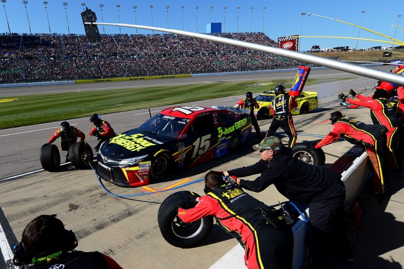 Clint Bowyer, driver of the #15 5-hour Energy Toyota, pits during the NASCAR Sprint Cup Series Hollywood Casino 400 at Kansas Speedway on October 18, 2015 in Kansas City, Kansas. Clint Bowyer, driver of the #15 5-hour Energy Toyota, pits during the NASCAR Sprint Cup Series Hollywood Casino 400 at Kansas Speedway on October 18, 2015 in Kansas City, Kansas.
