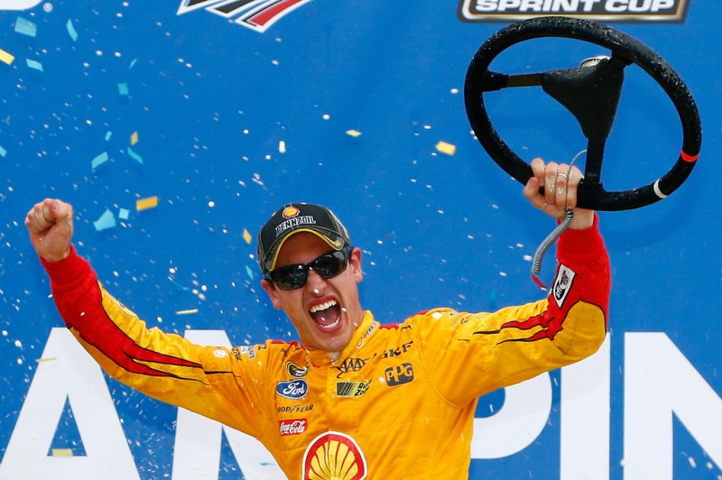 Joey Logano, driver of the #22 Shell Pennzoil Ford, celebrates in Victory Lane after winning the NASCAR Sprint Cup Series CampingWorld.com 500 at Talladega Superspeedway on October 25, 2015 in Talladega, Alabama. Joey Logano, driver of the #22 Shell Pennzoil Ford, celebrates in Victory Lane after winning the NASCAR Sprint Cup Series CampingWorld.com 500 at Talladega Superspeedway on October 25, 2015 in Talladega, Alabama.