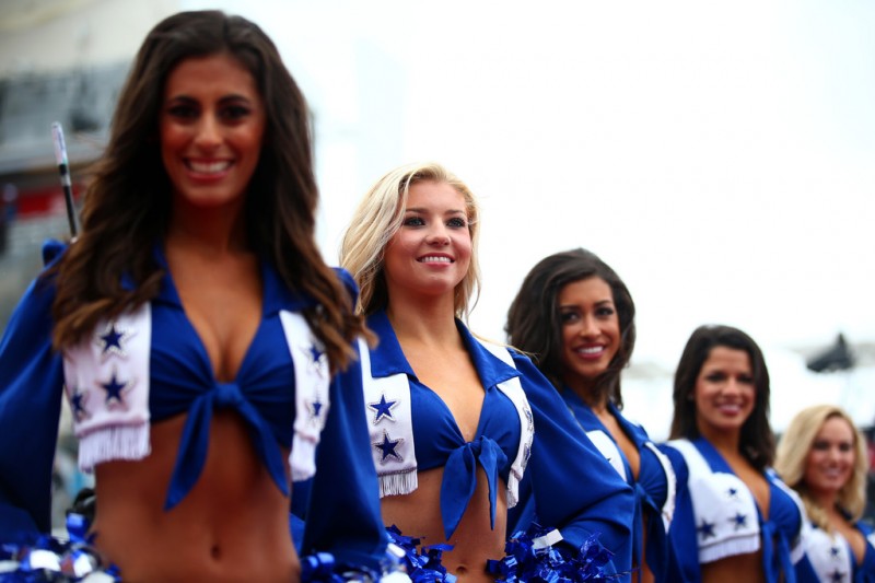 Grid girls pose before the drivers' parade ahead of the United States Formula One Grand Prix at Circuit of The Americas on October 25, 2015 in Austin, United States. Grid girls pose before the drivers' parade ahead of the United States Formula One Grand Prix at Circuit of The Americas on October 25, 2015 in Austin, United States.