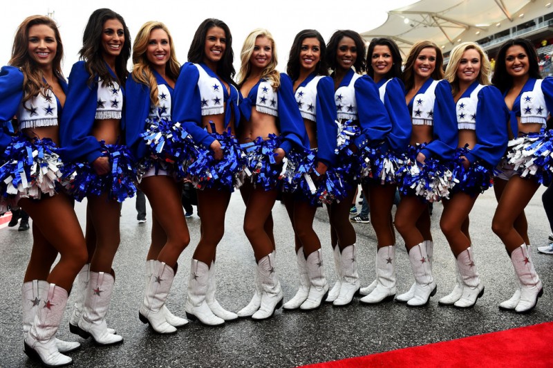 Grid girls pose before the drivers' parade ahead of the United States Formula One Grand Prix at Circuit of The Americas on October 25, 2015 in Austin, United States. Grid girls pose before the drivers' parade ahead of the United States Formula One Grand Prix at Circuit of The Americas on October 25, 2015 in Austin, United States.