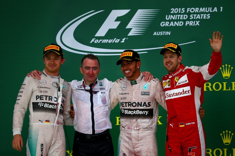 Lewis Hamilton of Great Britain and Mercedes GP celebrates on the podium next to Nico Rosberg of Germany and Mercedes GP, Paddy Lowe, Mercedes Technical Executive Director and Sebastian Vettel of Germany and Ferrari after winning the United States Formula One Grand Prix and the championship at Circuit of The Americas on October 25, 2015 in Austin, United States. Lewis Hamilton of Great Britain and Mercedes GP celebrates on the podium next to Nico Rosberg of Germany and Mercedes GP, Paddy Lowe, Mercedes Technical Executive Director and Sebastian Vettel of Germany and Ferrari after winning the United States Formula One Grand Prix and the championship at Circuit of The Americas on October 25, 2015 in Austin, United States.