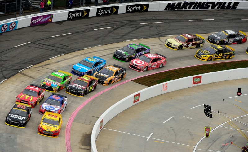 Joey Logano, driver of the #22 Shell Pennzoil Ford, and Martin Truex Jr., driver of the #78 Furniture Row/Visser Precision Chevrolet, lead the field during the NASCAR Sprint Cup Series Goody's Headache Relief Shot 500 at Martinsville Speedway on November 1, 2015 in Martinsville, Virginia. Joey Logano, driver of the #22 Shell Pennzoil Ford, and Martin Truex Jr., driver of the #78 Furniture Row/Visser Precision Chevrolet, lead the field during the NASCAR Sprint Cup Series Goody's Headache Relief Shot 500 at Martinsville Speedway on November 1, 2015 in Martinsville, Virginia.