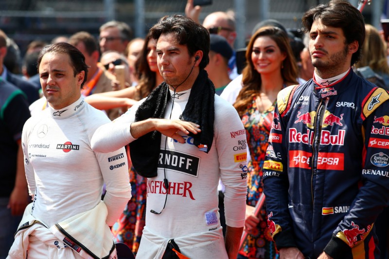 Sergio Perez of Mexico and Force India stands for the national anthem on the grid before the Formula One Grand Prix of Mexico at Autodromo Hermanos Rodriguez on November 1, 2015 in Mexico City, Mexico. Sergio Perez of Mexico and Force India stands for the national anthem on the grid before the Formula One Grand Prix of Mexico at Autodromo Hermanos Rodriguez on November 1, 2015 in Mexico City, Mexico.