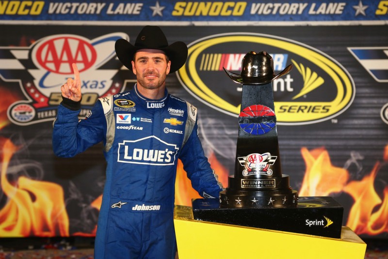 Jimmie Johnson, driver of the #48 Lowe's Chevrolet, celebrates with the trophy in victory lane after winning the NASCAR Sprint Cup Series AAA Texas 500 at Texas Motor Speedway on November 8, 2015 in Fort Worth, Texas. Jimmie Johnson, driver of the #48 Lowe's Chevrolet, celebrates with the trophy in victory lane after winning the NASCAR Sprint Cup Series AAA Texas 500 at Texas Motor Speedway on November 8, 2015 in Fort Worth, Texas.