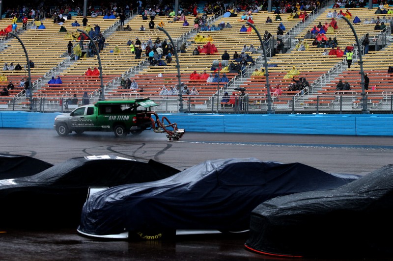 An Air Titan dries the racing surface during a rain delay for the NASCAR Sprint Cup Series Quicken Loans Race for Heroes 500 at Phoenix International Raceway on November 15, 2015 in Avondale, Arizona. An Air Titan dries the racing surface during a rain delay for the NASCAR Sprint Cup Series Quicken Loans Race for Heroes 500 at Phoenix International Raceway on November 15, 2015 in Avondale, Arizona.