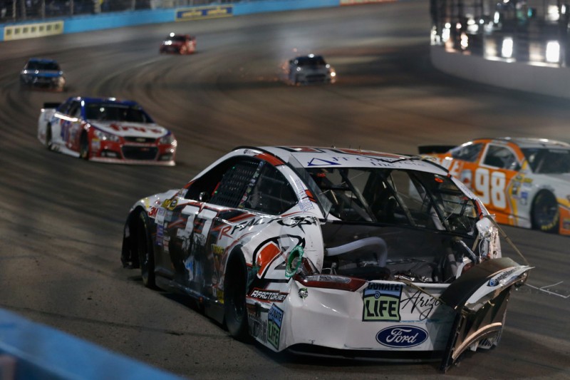 Joey Gase, driver of the #32 R Factor 2 Ford, is involved in an on-track incident during the NASCAR Sprint Cup Series Quicken Loans Race for Heroes 500 at Phoenix International Raceway on November 15, 2015 in Avondale, Arizona. Joey Gase, driver of the #32 R Factor 2 Ford, is involved in an on-track incident during the NASCAR Sprint Cup Series Quicken Loans Race for Heroes 500 at Phoenix International Raceway on November 15, 2015 in Avondale, Arizona.