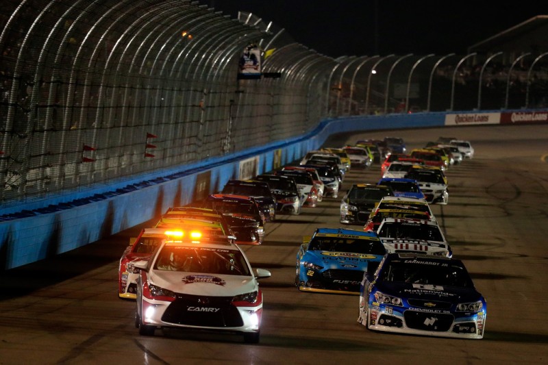 Dale Earnhardt Jr., driver of the #88 Nationwide Chevrolet, and Kevin Harvick, driver of the #4 Budweiser/Jimmy John's Chevrolet, lead the field under caution due to rain during the NASCAR Sprint Cup Series Quicken Loans Race for Heroes 500 at Phoenix International Raceway on November 15, 2015 in Avondale, Arizona. Dale Earnhardt Jr., driver of the #88 Nationwide Chevrolet, and Kevin Harvick, driver of the #4 Budweiser/Jimmy John's Chevrolet, lead the field under caution due to rain during the NASCAR Sprint Cup Series Quicken Loans Race for Heroes 500 at Phoenix International Raceway on November 15, 2015 in Avondale, Arizona.