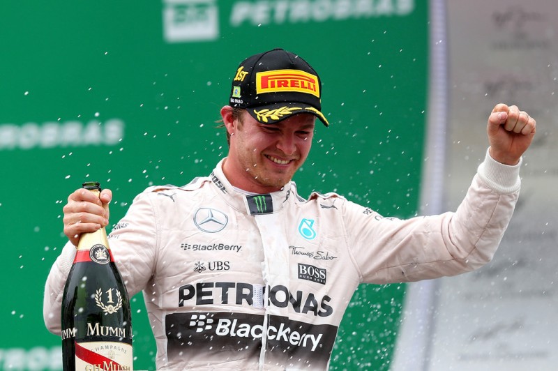 Nico Rosberg of Germany and Mercedes GP celebrates on the podium after winning the Formula One Grand Prix of Brazil at Autodromo Jose Carlos Pace on November 15, 2015 in Sao Paulo, Brazil. Nico Rosberg of Germany and Mercedes GP celebrates on the podium after winning the Formula One Grand Prix of Brazil at Autodromo Jose Carlos Pace on November 15, 2015 in Sao Paulo, Brazil.