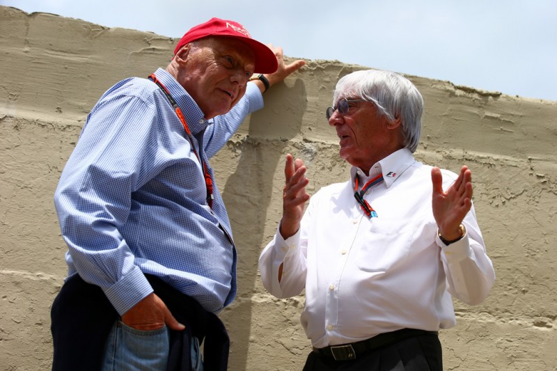 F1 supremo Bernie Ecclestone speaks with Mercedes GP non-executive chairman Niki Lauda on the grid before the Formula One Grand Prix of Brazil at Autodromo Jose Carlos Pace on November 15, 2015 in Sao Paulo, Brazil. F1 supremo Bernie Ecclestone speaks with Mercedes GP non-executive chairman Niki Lauda on the grid before the Formula One Grand Prix of Brazil at Autodromo Jose Carlos Pace on November 15, 2015 in Sao Paulo, Brazil.