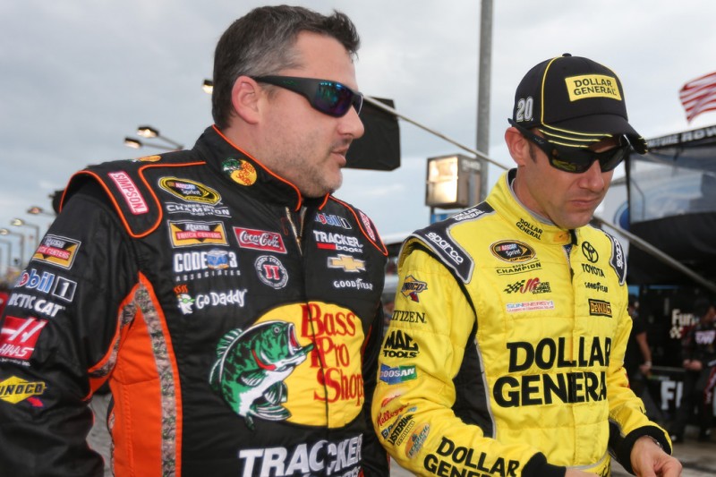 Tony Stewart, driver of the #14 Bass Pro Shops/Mobil 1 Chevrolet, talks to Matt Kenseth, driver of the #20 Dollar General Toyota, during the NASCAR Sprint Cup Series Ford EcoBoost 400 at Homestead-Miami Speedway on November 22, 2015 in Homestead, Florida. Tony Stewart, driver of the #14 Bass Pro Shops/Mobil 1 Chevrolet, talks to Matt Kenseth, driver of the #20 Dollar General Toyota, during the NASCAR Sprint Cup Series Ford EcoBoost 400 at Homestead-Miami Speedway on November 22, 2015 in Homestead, Florida.