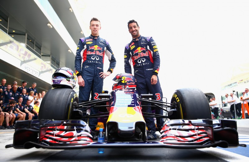 Daniel Ricciardo of Australia and Infiniti Red Bull Racing and Daniil Kvyat of Russia and Infiniti Red Bull Racing take part in the team photograph in the pit lane before the Abu Dhabi Formula One Grand Prix at Yas Marina Circuit on November 29, 2015 in Abu Dhabi, United Arab Emirates. Daniel Ricciardo of Australia and Infiniti Red Bull Racing and Daniil Kvyat of Russia and Infiniti Red Bull Racing take part in the team photograph in the pit lane before the Abu Dhabi Formula One Grand Prix at Yas Marina Circuit on November 29, 2015 in Abu Dhabi, United Arab Emirates.