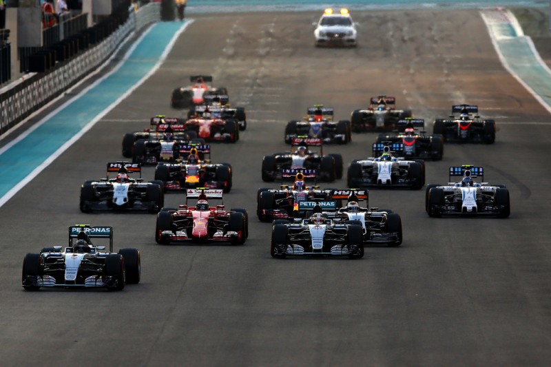 Nico Rosberg of Germany and Mercedes GP leads Lewis Hamilton of Great Britain and Mercedes GP into the first corner during the Abu Dhabi Formula One Grand Prix at Yas Marina Circuit on November 29, 2015 in Abu Dhabi, United Arab Emirates. Nico Rosberg of Germany and Mercedes GP leads Lewis Hamilton of Great Britain and Mercedes GP into the first corner during the Abu Dhabi Formula One Grand Prix at Yas Marina Circuit on November 29, 2015 in Abu Dhabi, United Arab Emirates.