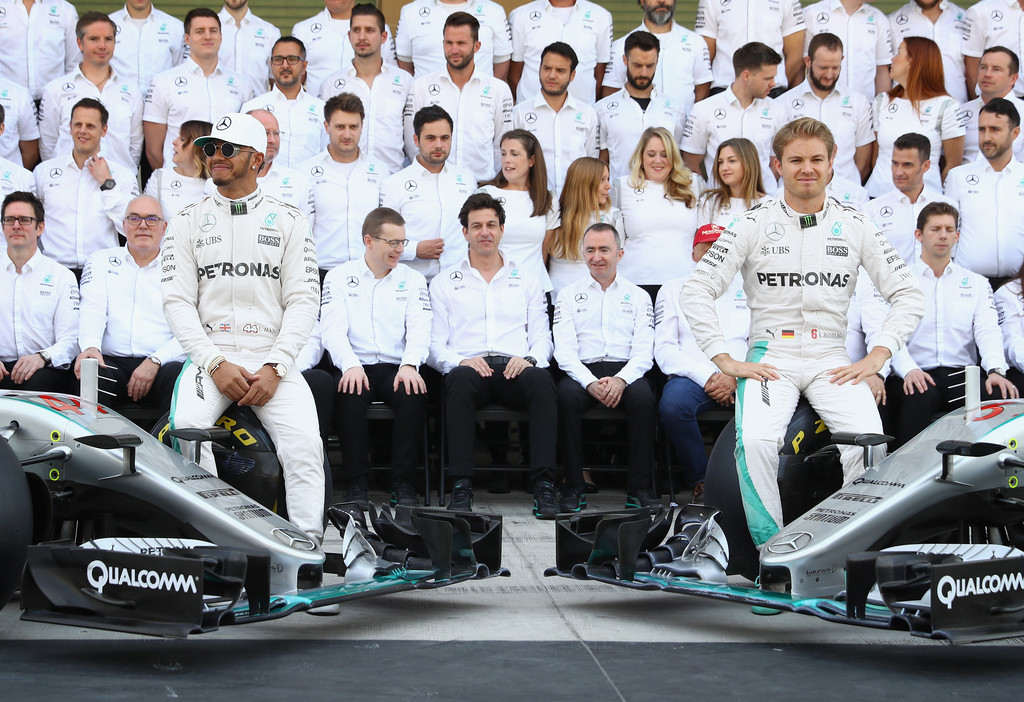 Nico Rosberg of Germany and Mercedes GP and Lewis Hamilton of Great Britain and Mercedes GP at the Mercedes team photo during the Abu Dhabi Formula One Grand Prix at Yas Marina Circuit on November 27, 2016 in Abu Dhabi, United Arab Emirates. Nico Rosberg of Germany and Mercedes GP and Lewis Hamilton of Great Britain and Mercedes GP at the Mercedes team photo during the Abu Dhabi Formula One Grand Prix at Yas Marina Circuit on November 27, 2016 in Abu Dhabi, United Arab Emirates.