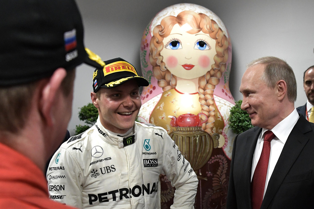Russian President Vladimir Putin meets with winner Mercedes' Finnish driver Valtteri Bottas after the Formula One Russian Grand Prix at the Sochi Autodrom circuit in Sochi on April 30, 2017. Russian President Vladimir Putin meets with winner Mercedes' Finnish driver Valtteri Bottas after the Formula One Russian Grand Prix at the Sochi Autodrom circuit in Sochi on April 30, 2017.