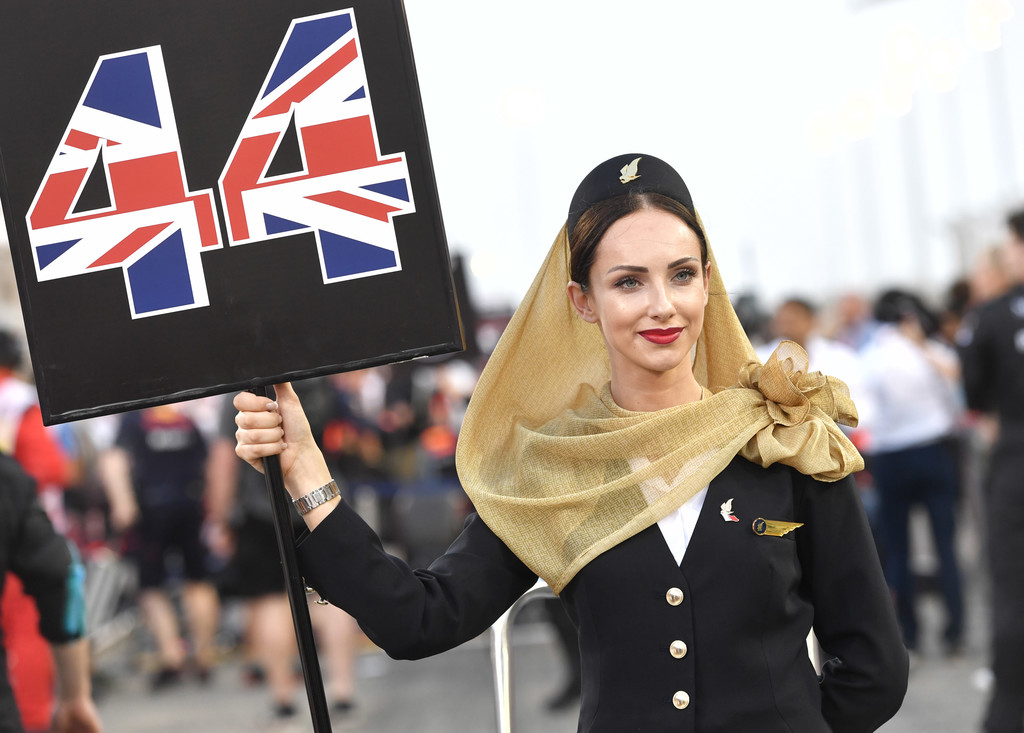 A woman shows a signboard for Mercedes' British driver Lewis Hamilton ahead of the Bahrain Formula One Grand Prix at the Sakhir circuit in Manama on April 16, 2017. A woman shows a signboard for Mercedes' British driver Lewis Hamilton ahead of the Bahrain Formula One Grand Prix at the Sakhir circuit in Manama on April 16, 2017.