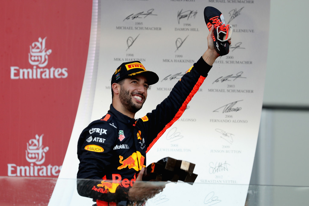 Race winner Daniel Ricciardo of Australia and Red Bull Racing celebrates his win on the podium during the Azerbaijan Formula One Grand Prix at Baku City Circuit on June 25, 2017 in Baku, Azerbaijan. Race winner Daniel Ricciardo of Australia and Red Bull Racing celebrates his win on the podium during the Azerbaijan Formula One Grand Prix at Baku City Circuit on June 25, 2017 in Baku, Azerbaijan.