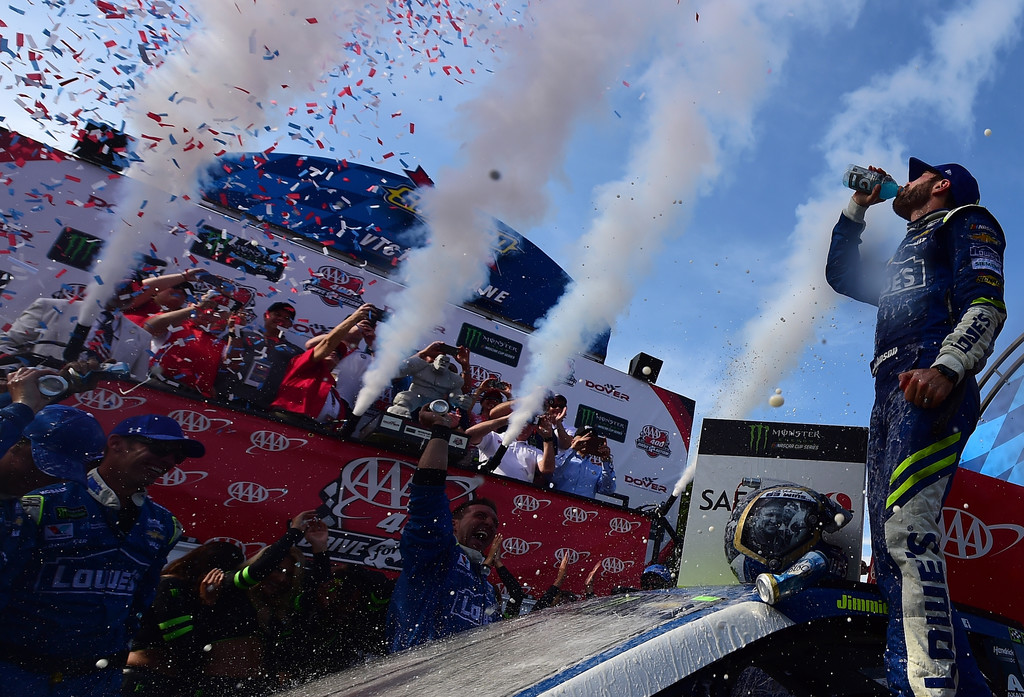 Jimmie Johnson, driver of the #48 Lowe's Chevrolet, celebrates in Victory Lane after winning the Monster Energy NASCAR Cup Series AAA 400 Drive for Autism at Dover International Speedway on June 4, 2017 in Dover, Delaware. Jimmie Johnson, driver of the #48 Lowe's Chevrolet, celebrates in Victory Lane after winning the Monster Energy NASCAR Cup Series AAA 400 Drive for Autism at Dover International Speedway on June 4, 2017 in Dover, Delaware.