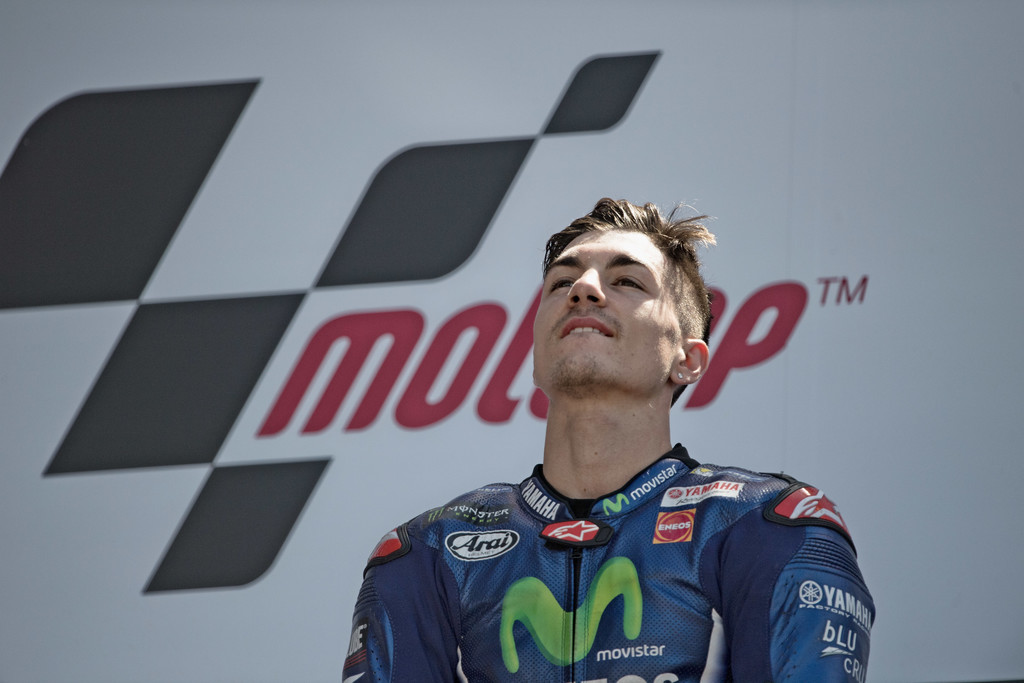 Maverick Vinales of Spain and Movistar Yamaha MotoGP celebrates the victory on the podium at the end of the MotoGP race during the MotoGp of France - Race on May 21, 2017 in Le Mans, France. Maverick Vinales of Spain and Movistar Yamaha MotoGP celebrates the victory on the podium at the end of the MotoGP race during the MotoGp of France - Race on May 21, 2017 in Le Mans, France.