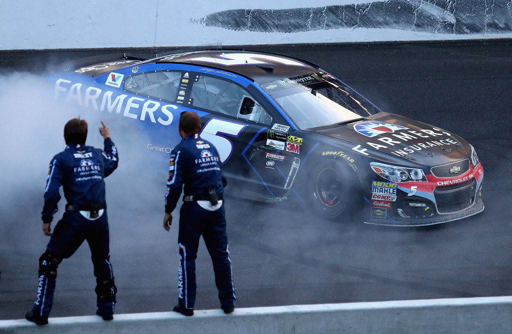 Kasey Kahne, driver of the #5 Farmers Insurance Chevrolet, celebrates with a burnout after winning the Monster Energy NASCAR Cup Series Brickyard 400 at Indianapolis Motorspeedway on July 23, 2017 in Indianapolis, Indiana. Kasey Kahne, driver of the #5 Farmers Insurance Chevrolet, celebrates with a burnout after winning the Monster Energy NASCAR Cup Series Brickyard 400 at Indianapolis Motorspeedway on July 23, 2017 in Indianapolis, Indiana.